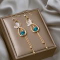 Blue Teardrop White Flower Gold Tone Extra Long Hook Earrings view 1