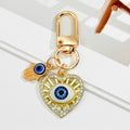 Gold Evil Eye Hamsa Hand Keychain With Blue Eye Charm view 8