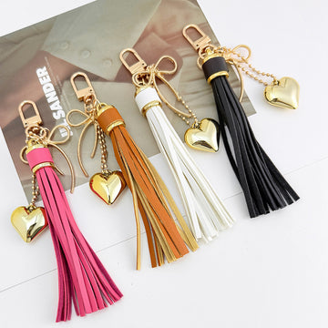 PU Leather Tassel Charm With Bow And Heart Pendant