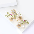 Enamel Plum Blossom Branch Brooch With Polished Metal And Sculpted Decorative Details view 4