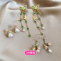 Gold Tone Pearl Butterfly Bow Earring Three Pair Sets view 6