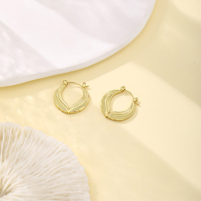 Sixty-Five Gold Tone Sculptural Small Hoop Earrings