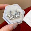 Rocking Horse Pearl Stud Earrings In Gold And Silver view 6