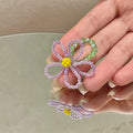 Three Mixed Beaded Rings In Pink Lavender Green Blue And White view 7