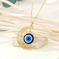 Gold Tone Openwork Crescent Moon Evil Eye Pendant Necklace view 1