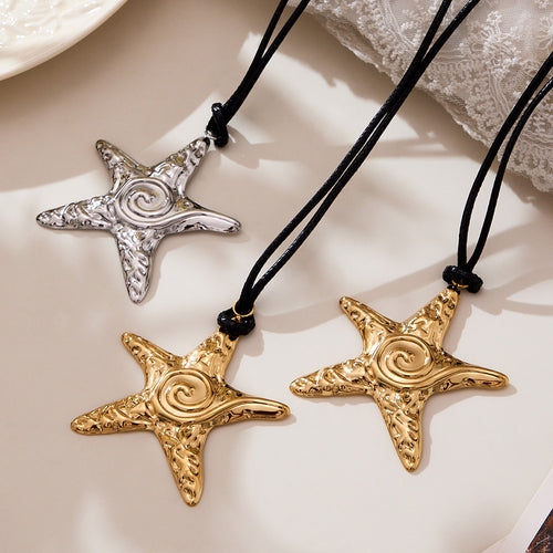 Grouped style view of long black cord starfish pendant necklaces in main image 1.