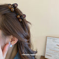 Mini Brown Tortoiseshell Hair Claw With Three Round Beads view 2