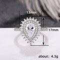 Silver Tone Pear Center Halo Ring With Pavé Shoulders view 5