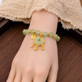 Green Bead Fu Medallion Lock Charm Stretch Bracelet view 3