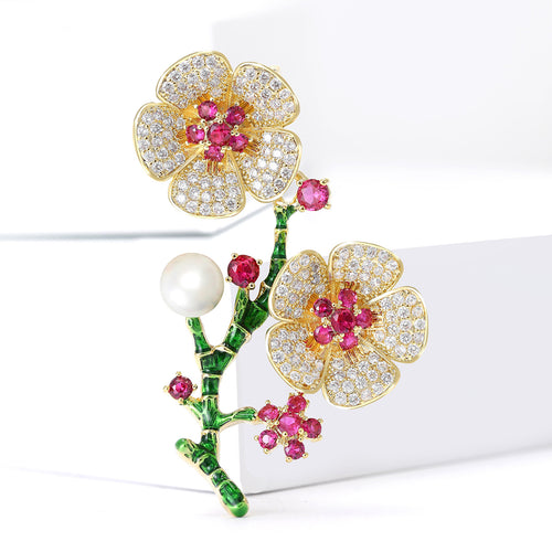 Alternate finish view of gold tone flowering branch with pink centers pearls and green enamel stems