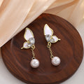 White Petal Butterfly Pearl Look Gold Chain Earrings view 2