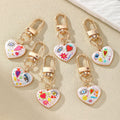 Gold Tone Small Printed Heart Evil Eye Clip Keychains in Six Designs view 1