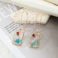 Gold Tone Rectangular Clear Resin Pressed Flower Long Wire Earrings view 6