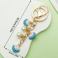 Starfish, Conch and Shell Charm Keychains Featuring Starfish, Conch Across 64 Variations view 9
