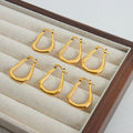 Gold Steel Irregular Teardrop Organic Open Hoop Earrings view 3