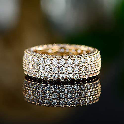 Product view showing multi-row pave full eternity wide ring in three metal tones