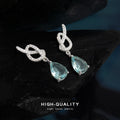 Silver Tone Clear Stone Knot And Aqua Teardrop Stud Earrings view 4