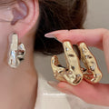 Crinkled Geometric Stud Earrings in Gold and Silver view 2