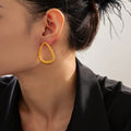 Gold Twisted Rope Triangle Teardrop Hoop Earrings Pair view 3