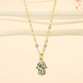 Gold Tone Crystal Hamsa Hand Pendant Necklace with Fine Chain view 1
