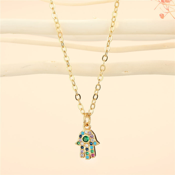 Gold Tone Crystal Hamsa Hand Pendant Necklace with Fine Chain