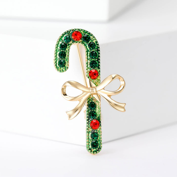 Green Crystal Candy Cane Brooch With Red Stones and Gold Bow