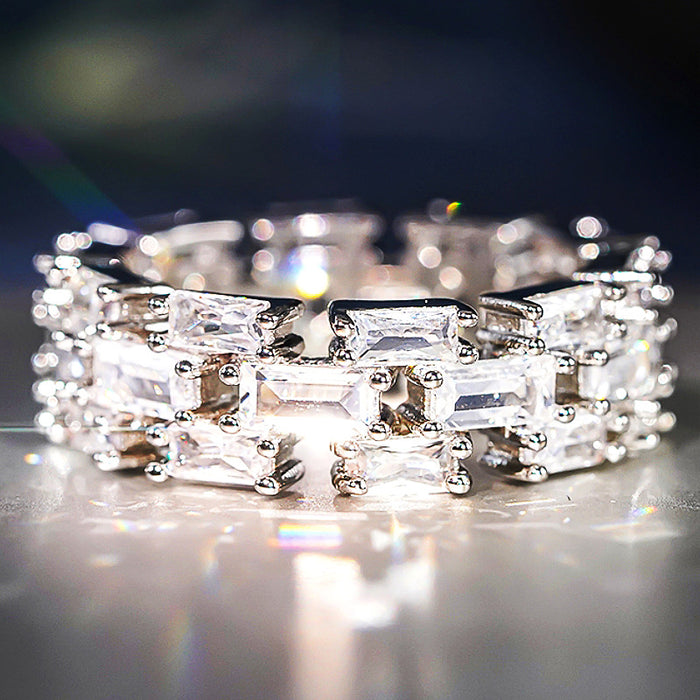 Silver-Tone Baguette Link Eternity Band Ring with Clear Stone Details
