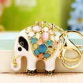White Enamel Elephant Keychains with Multicolor Cabochon Backs view 3