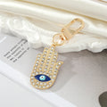 Gold Tone Crystal Hamsa Eye Necklace and Clip Keychain Options view 3