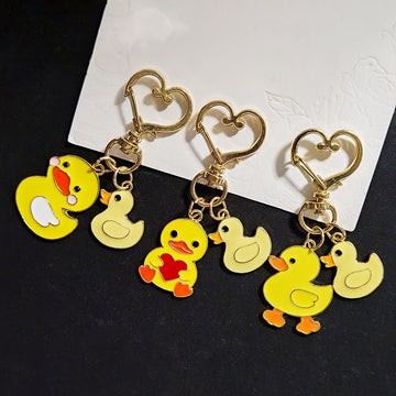 Yellow Duck Pair Heart-Clasp Charms in Three Designs