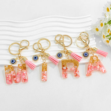 Resin Initial Letter Keychain with Evil Eye and Pink Tassel