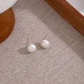 White Pearl Look Round Stud Earrings in Three Sizes view 3