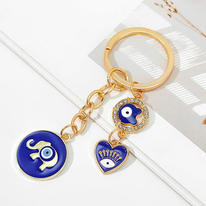 Blue Evil Eye Keychain with Enamel Charms and Rhinestone Accents