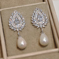 Pearl Teardrop Crystal Bridal Drop Earrings With Clear Stone Accents view 4