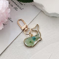 Gold Tone Pressed Flower Whale Resin Clip Keychains in Eight Designs view 3