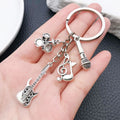 Silver Tone Guitar Drum and Saxophone Music Keychains view 3