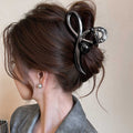 Gunmetal Tone Large Sculptural Loop Hair Claw With Black Round Bead view 3