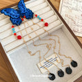 Blue Knit Butterfly Duckbill Clip Red Bead Chain Tassels view 2