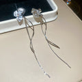 Three Petal Flower Linear Tassel Clip On Earrings With Polished Metal Details view 6