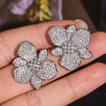 Pave CZ Flower Orchid Stud Earrings Silver Or Gold Tone view 5