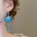 Blue Crystal Petal and Chain Fringe Hook Earrings with Polished Details view 3
