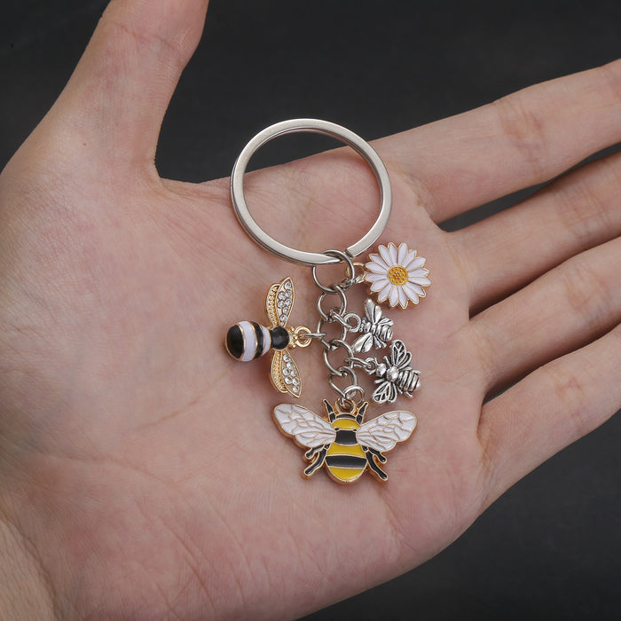 Bee Daisy and Honeycomb Silver Tone Metal Keychain