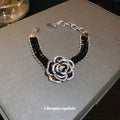 Black Crystal Camellia Flower Bracelet With Crystal Flower Center view 2
