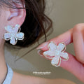 Iridescent Five Petal Flower Stud Earrings In Three Tints view 3