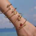 Gold Open Cuff Bracelets Dual Starfish Bee Ladybug Charms view 4