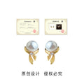 Gold Pearl Bow Stud Earrings Clear Crystal Accent Pair view 3