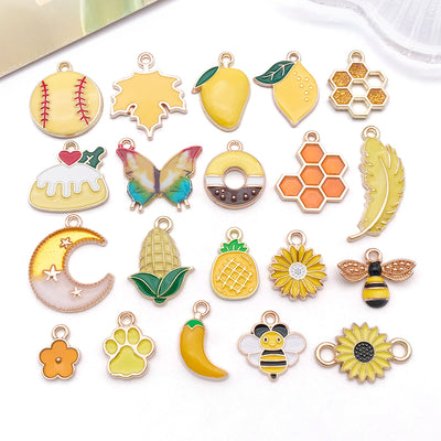 Colorful moon charms arranged on a light background