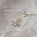 Gold Four Prong Clear Crystal Stud Earrings Minimal Pair view 1