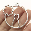 Cat and Flower Open Frame Round Metal Pendant in Two Finishes view 1