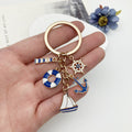 Blue Nautical Lifebuoy Anchor and Sailboat Keychain Set view 3
